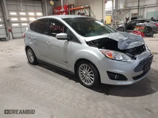 2016 Ford C-Max Energi SEL with VIN 1FADP5CU7GL113905, listed as a IAAI auction lot 41520928 with 147,008 mi miles. Bid and sale history available at carsss.com. Image 1.