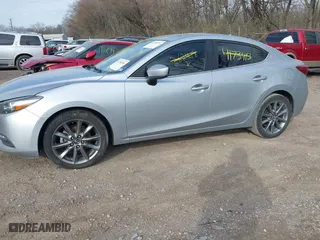 2018 Mazda Mazda3 4-Door Touring with VIN 3MZBN1V37JM262418, listed as a IAAI auction lot 41880212 with 118,662 mi miles. Bid and sale history available at carsss.com. Image 14.