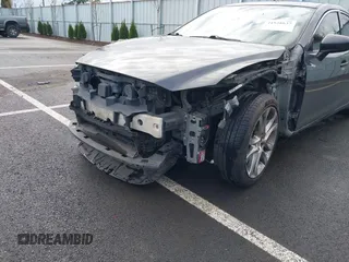 2014 Mazda 6 i Grand Touring with VIN JM1GJ1W63E1147380, listed as a IAAI auction lot 41928637 with 140,091 mi miles and . Bid and sale history available at DreamBid. Image 6.