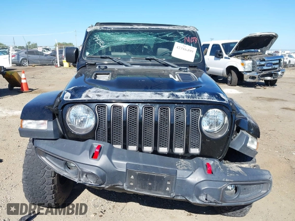 2018 Jeep Wrangler Unlimited Rubicon with VIN 1C4HJXFGXJW255881, listed as a IAAI auction lot 42316499 with 39,439 mi miles and . Bid and sale history available at DreamBid. Image 13.
