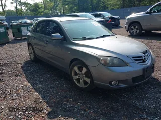 2006 Mazda 3 S Grand Touring z VIN JM1BK344561456189, wystawiony jako IAAI lot #42459158 z przebiegiem 167 794 mil mil oraz . Historia ofert i sprzedaży dostępna na DreamBid. Obrazek 1.