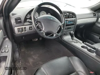2005 Ford Thunderbird Deluxe z VIN 1FAHP60A25Y103624, wystawiony jako Copart lot #58043635 z przebiegiem 121 881 mil mil oraz Tytuł czysty. Historia ofert i sprzedaży dostępna na DreamBid. Obrazek 8.