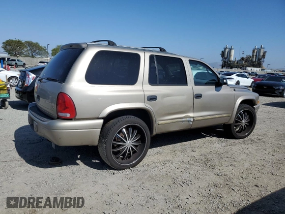 2003 Dodge Durango SLT z VIN 1D4HR48N83F519253, wystawiony jako Copart lot #55179995 z przebiegiem 193 596 mil mil oraz Szkoda całkowita • Salvage title. Historia ofert i sprzedaży dostępna na DreamBid. Obrazek 3.