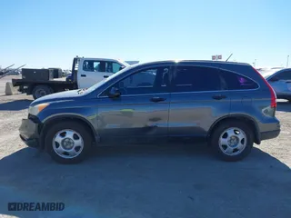 2011 Honda CR-V LX with VIN 3CZRE3H32BG704945, listed as a IAAI auction lot 41414275 with 218,831 mi miles. Bid and sale history available at carsss.com. Image 14.