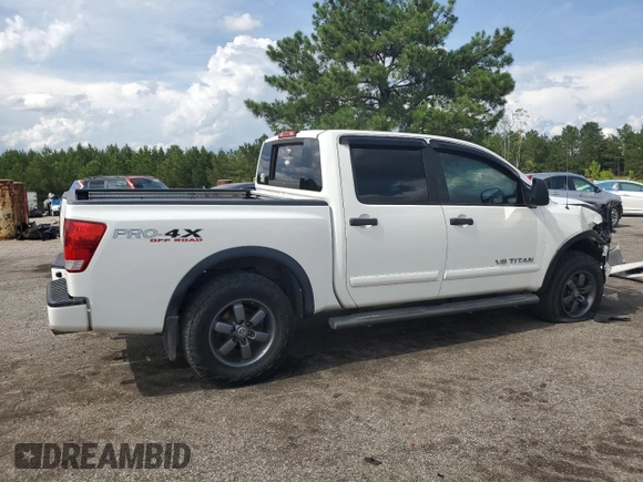 2012 Nissan Titan SV z VIN 1N6BA0EC2CN309207, wystawiony jako Copart lot #60451435 z przebiegiem 124 900 mil mil oraz Szkoda całkowita • Salvage title. Historia ofert i sprzedaży dostępna na DreamBid. Obrazek 3.