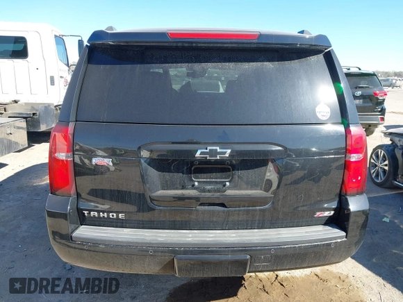 2017 Chevrolet Tahoe LT with VIN 1GNSKBKC6HR394138, listed as a IAAI auction lot 41852966 with 130,711 mi miles and . Bid and sale history available at DreamBid. Image 16.