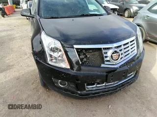 2016 Cadillac SRX Performance Collection z VIN 3GYFNCE32GS505552, wystawiony jako IAAI lot #40949642 z przebiegiem 143 343 mil mil oraz . Historia ofert i sprzedaży dostępna na DreamBid. Obrazek 6.
