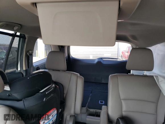 2022 Honda Pilot Touring 7-Passenger with VIN 5FNYF6H64NB054732, listed as a Copart auction lot 63036104 with 33,252 mi miles and Salvage Title. Bid and sale history available at carsss.com. Image 10.