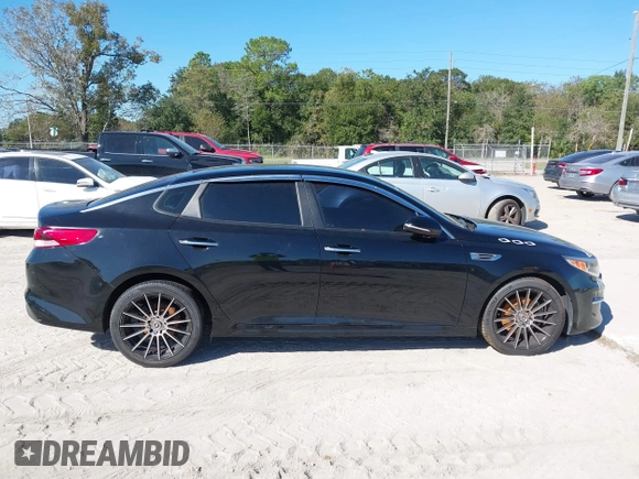 2018 Kia Optima LX with VIN 5XXGT4L3XJG203237, listed as a IAAI auction lot 40631696 with 157,012 mi miles and . Bid and sale history available at DreamBid. Image 14.