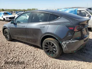 2024 Tesla Model Y Long Range with VIN 7SAYGDEE9RA221380, listed as a Copart auction lot 47516705 with 10,930 mi miles and Salvage Title. Bid and sale history available at DreamBid. Image 2.