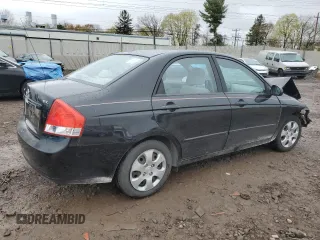 2009 Kia Spectra EX with VIN KNAFE222495648220, listed as a Copart auction lot 52886915 with 146,417 mi miles and Salvage title. Bid and sale history available at DreamBid. Image 3.