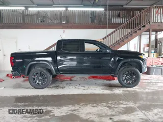 2023 Chevrolet Colorado 4WD Trail Boss with VIN 1GCPTEEK3P1261771, listed as a IAAI auction lot 42535710 with 30,000 mi miles and . Bid and sale history available at DreamBid. Image 13.