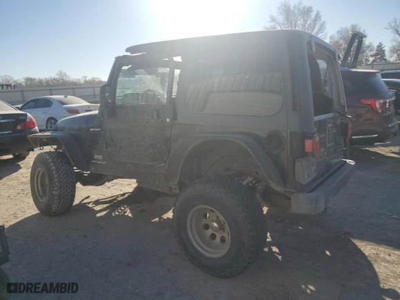 2004 Jeep Wrangler Sport with VIN 1J4FA49S64P717397, listed as a Copart auction lot 82970994 with 0 mi miles and Salvage Title. Bid and sale history available at carsss.com. Image 2.