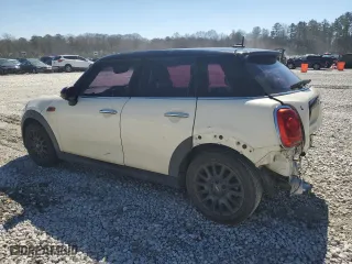 2017 MINI Hardtop 4 Door Cooper with VIN WMWXU1C59H2E17486, listed as a Copart auction lot 46502315 with 107,639 mi miles and Salvage Title. Bid and sale history available at carsss.com. Image 2.