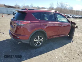2018 Toyota RAV4 XLE with VIN 2T3RFREVXJW715931, listed as a Copart auction lot 48130715 with 106,324 mi miles and Salvage Title. Bid and sale history available at DreamBid. Image 3.