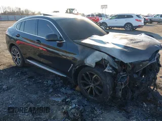 2020 BMW X4 xDrive30i with VIN 5UX2V1C00L9C35589, listed as a IAAI auction lot 41425163 with 1 mi miles. Bid and sale history available at carsss.com. Image 1.