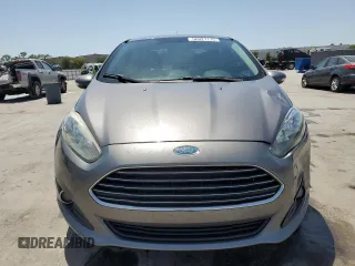 2014 Ford Fiesta SE z VIN 3FADP4BJ4EM110277, wystawiony jako Copart lot #56921115 z przebiegiem 126 536 mil mil oraz Szkoda całkowita • Salvage title. Historia ofert i sprzedaży dostępna na DreamBid. Obrazek 5.