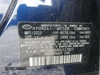 2023 Genesis G70 2.0T with VIN KMTG34TA8PU127827, listed as a Copart auction lot 59662305 with 6,310 mi miles and Salvage title. Bid and sale history available at DreamBid. Image 12.