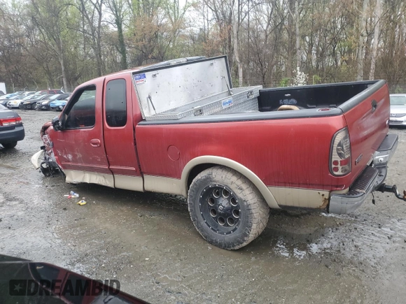1999 Ford F-150 XL with VIN 1FTRX18L8XNB30435, listed as a Copart auction lot 51739345 with 0 mi miles and Salvage Title. Bid and sale history available at carsss.com. Image 2.