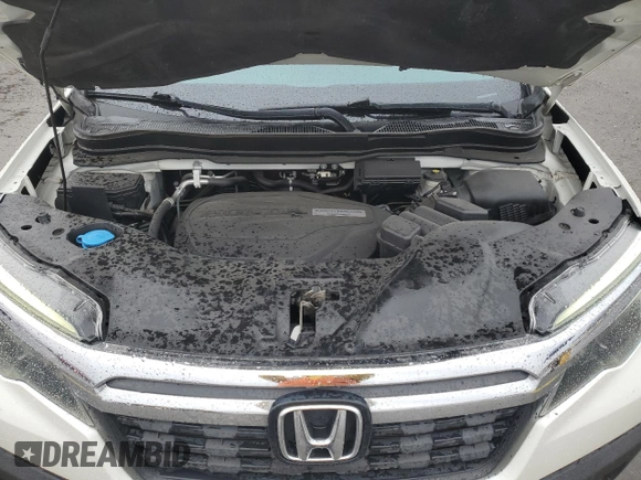 2019 Honda Ridgeline RTL-T with VIN 5FPYK2F61KB001996, listed as a Copart auction lot 45327165 with 57,018 mi miles and Salvage title. Bid and sale history available at DreamBid. Image 11.