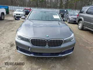 2017 BMW 7 Series 740i with VIN WBA7E2C54HG740170, listed as a IAAI auction lot 41432578 with 110,893 mi miles and . Bid and sale history available at DreamBid. Image 6.