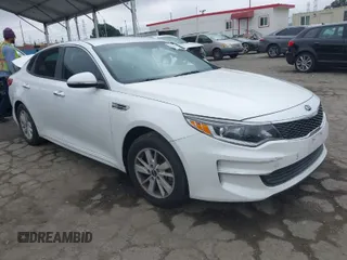 2017 Kia Optima LX z VIN KNAGT4L37H5160410, wystawiony jako IAAI lot #41906061 z przebiegiem 88 243 mil mil oraz . Historia ofert i sprzedaży dostępna na DreamBid. Obrazek 1.