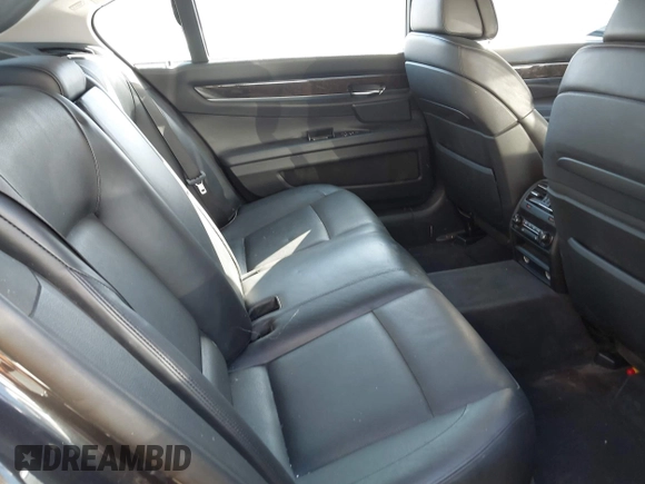 2012 BMW 7 Series 750Li xDrive with VIN WBAKC8C55CC436123, listed as a IAAI auction lot 41779443 with 126,618 mi miles and . Bid and sale history available at DreamBid. Image 8.