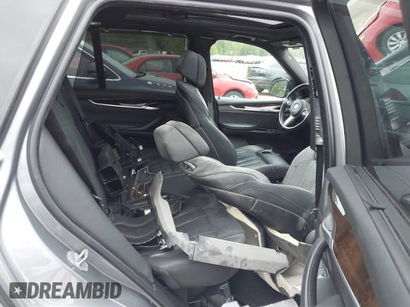 2014 BMW X5 xDrive50i with VIN 5UXKR6C54E0C02423, listed as a IAAI auction lot 42278044 with 122,370 mi miles and . Bid and sale history available at DreamBid. Image 8.