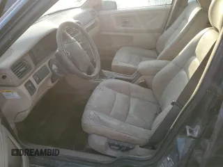 1998 Volvo S70 z VIN YV1LS5675W3511553, wystawiony jako Copart lot #75102454 z przebiegiem Nie podano mil oraz Szkody całkowita. Historia ofert i sprzedaży dostępna na DreamBid. Obrazek 7.