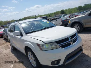 2012 Dodge Journey Crew with VIN 3C4PDCDG5CT390712, listed as a IAAI auction lot 41970699 with 175,975 mi miles and . Bid and sale history available at DreamBid. Image 1.