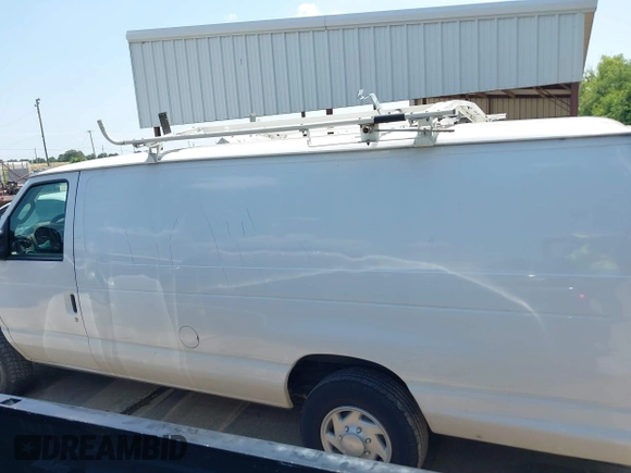 2013 Ford Econoline Cargo Commercial with VIN 1FTSS3EL6DDA11915, listed as a IAAI auction lot 42404089 with 332,717 mi miles and . Bid and sale history available at DreamBid. Image 14.