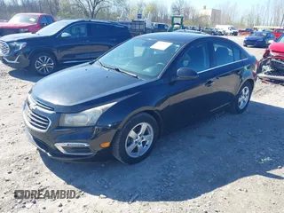 2015 Chevrolet Cruze LT with VIN 1G1PC5SB3F7113824, listed as a IAAI auction lot 42220643 with 122,213 mi miles and . Bid and sale history available at DreamBid. Image 2.