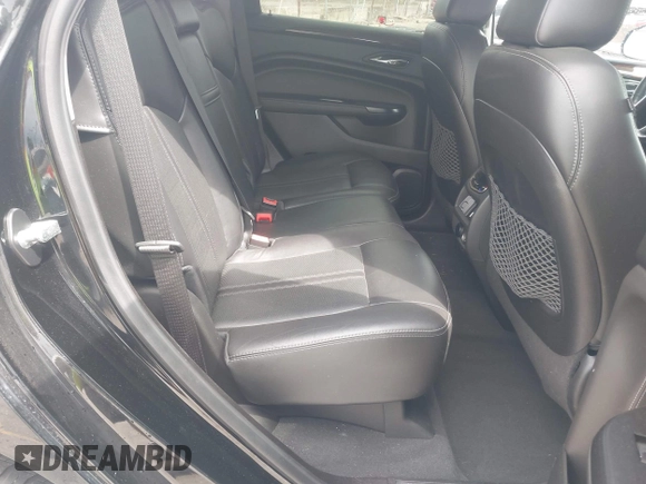 2015 Cadillac SRX Premium Collection with VIN 3GYFNGE30FS634363, listed as a IAAI auction lot 42672064 with 146,821 mi miles and . Bid and sale history available at DreamBid. Image 8.
