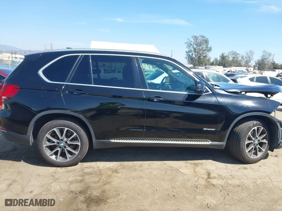 2017 BMW X5 sDrive35i with VIN 5UXKR2C5XH0U17833, listed as a IAAI auction lot 41856074 with 115,666 mi miles. Bid and sale history available at carsss.com. Image 14.