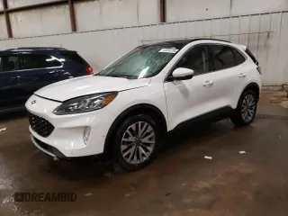 2020 Ford Escape Titanium Hybrid z VIN 1FMCU9DZXLUC27803, wystawiony jako Copart lot #43334755 z przebiegiem 135 001 mil mil oraz Nie do naprawy • Non repairable. Historia ofert i sprzedaży dostępna na DreamBid. Obrazek 1.
