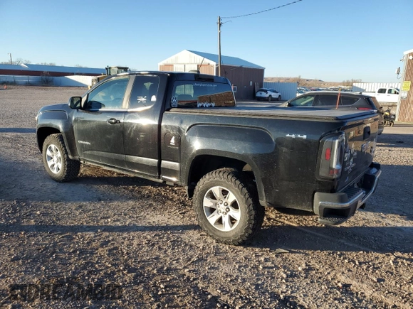 2015 GMC Canyon 4WD SLE with VIN 1GTH6BE37F1133213, listed as a Copart auction lot 82404014 with 142,149 mi miles and Salvage Title. Bid and sale history available at carsss.com. Image 2.