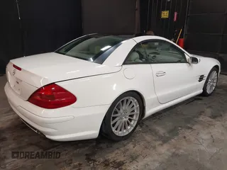 2004 Mercedes-Benz SL 500 z VIN WDBSK75F74F072792, wystawiony jako IAAI lot #42415790 z przebiegiem 66 100 mil mil oraz . Historia ofert i sprzedaży dostępna na DreamBid. Obrazek 4.