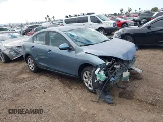 2010 Mazda Mazda3 i Touring with VIN JM1BL1SG5A1299819, listed as a IAAI auction lot 41450138 with 118,873 mi miles. Bid and sale history available at carsss.com. Image 1.