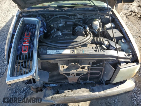 2002 GMC Sonoma SL z VIN 1GTCS145628255534, wystawiony jako Copart lot #80115964 z przebiegiem 78 550 mil mil oraz Szkody całkowita. Historia ofert i sprzedaży dostępna na DreamBid. Obrazek 11.