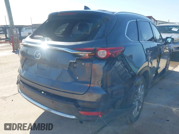 2019 Mazda CX-9 Grand Touring with VIN JM3TCADY8K0335429, listed as a IAAI auction lot 41203657 with 94,333 mi miles. Bid and sale history available at carsss.com. Image 6.