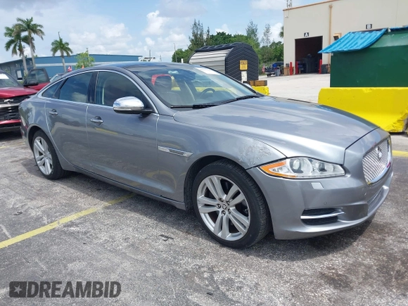 2013 Jaguar XJ with VIN SAJWJ1CD4D8V46305, listed as a IAAI auction lot 42637329 with 101,532 mi miles and . Bid and sale history available at DreamBid. Image 1.