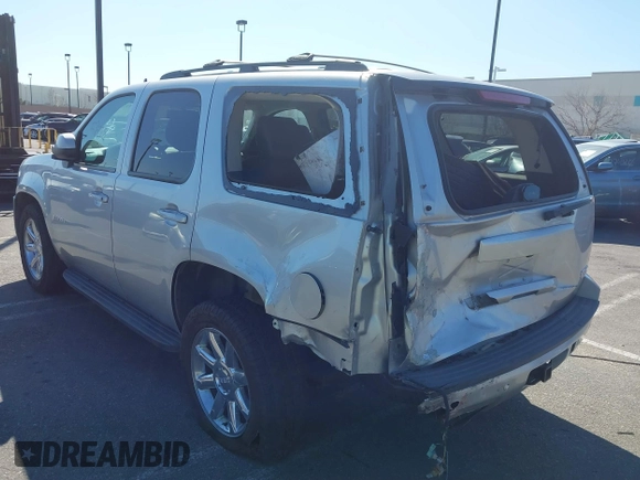 2013 GMC Yukon SLT with VIN 1GKS1CE07DR157076, listed as a IAAI auction lot 41557228 with 148,242 mi miles. Bid and sale history available at carsss.com. Image 3.