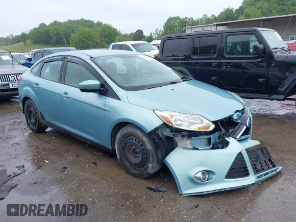 2012 Ford Focus SE with VIN 1FAHP3F21CL226033, listed as a IAAI auction lot 42368786 with 168,061 mi miles and . Bid and sale history available at DreamBid. Image 1.