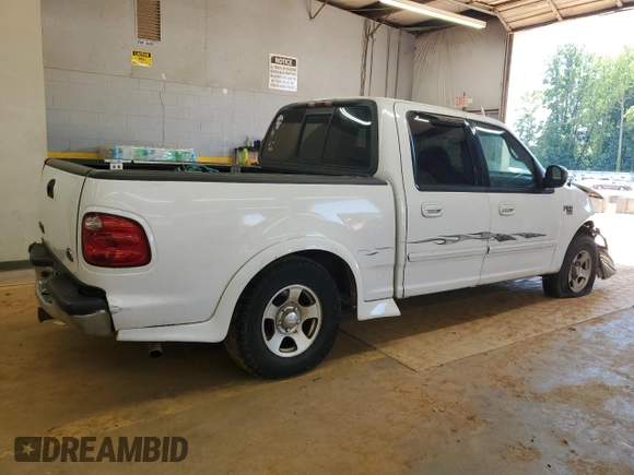 2001 Ford F-150 XLT with VIN 1FTRW07W51KE03221, listed as a Copart auction lot 63628855 with 237,510 mi miles and Salvage title. Bid and sale history available at DreamBid. Image 3.