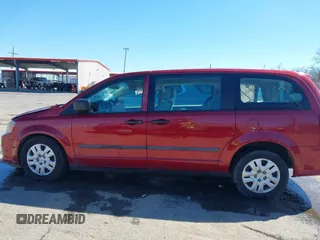 2014 Dodge Grand Caravan American Value with VIN 2C4RDGBG6ER223820, listed as a IAAI auction lot 41705097 with 213,180 mi miles and . Bid and sale history available at DreamBid. Image 14.