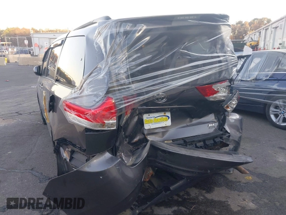 2012 Toyota Sienna XLE with VIN 5TDDK3DC6CS040442, listed as a IAAI auction lot 40899461 with 174,738 mi miles and . Bid and sale history available at DreamBid. Image 6.