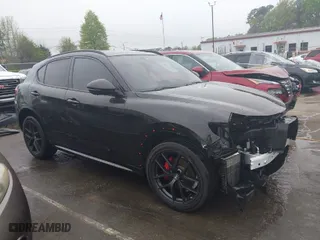 2021 Alfa Romeo Stelvio Ti with VIN ZASPAKBN9M7D09213, listed as a IAAI auction lot 41812289 with 38,410 mi miles. Bid and sale history available at carsss.com. Image 14.