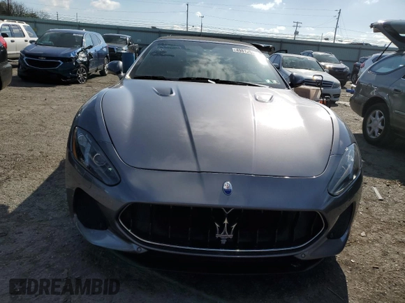 2018 Maserati GranTurismo Sport z VIN ZAM45VMAXJ0310303, wystawiony jako Copart lot #49812583 z przebiegiem 35 520 mil mil oraz . Historia ofert i sprzedaży dostępna na DreamBid. Obrazek 5.