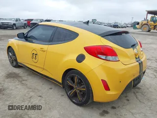 2013 Hyundai Veloster w/Black Int with VIN KMHTC6AD4DU167576, listed as a IAAI auction lot 41491479 with 90,033 mi miles and . Bid and sale history available at DreamBid. Image 3.