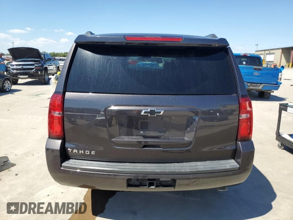 2018 Chevrolet Tahoe LT with VIN 1GNSCBKC7JR177782, listed as a Copart auction lot 73240494 with 138,296 mi miles and Salvage title. Bid and sale history available at DreamBid. Image 6.
